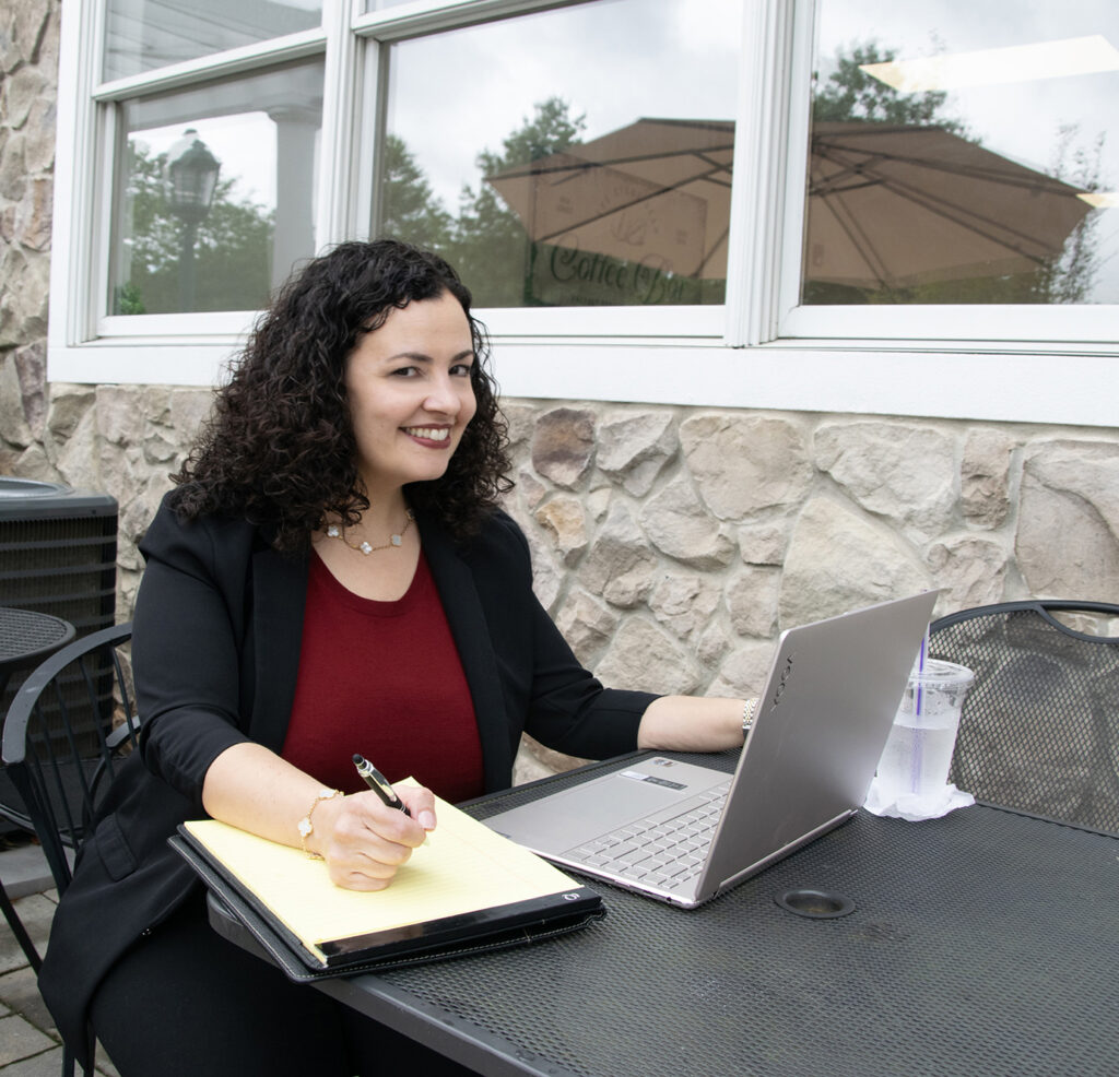 Susan Russo working on computer